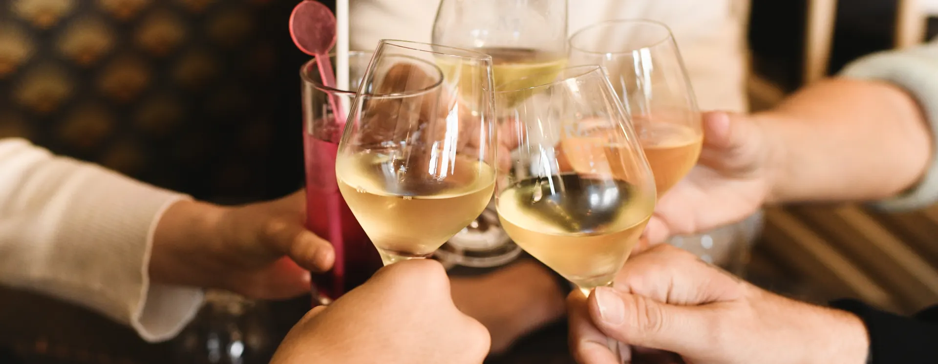 A group toast at a celebration at Restaurante Akquaaa in Calafell